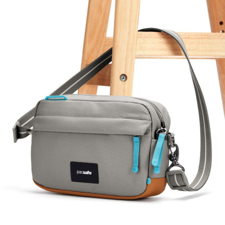 Сумка через плече антизлодій Pacsafe GO Crossbody (сірий/помаранчевий)