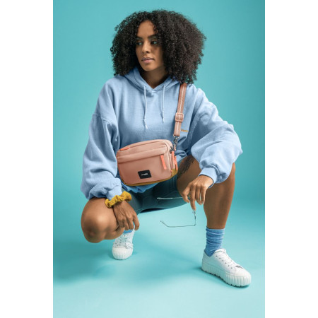 Сумка через плече антизлодій Pacsafe GO Crossbody (рожевий/помаранчевий)
