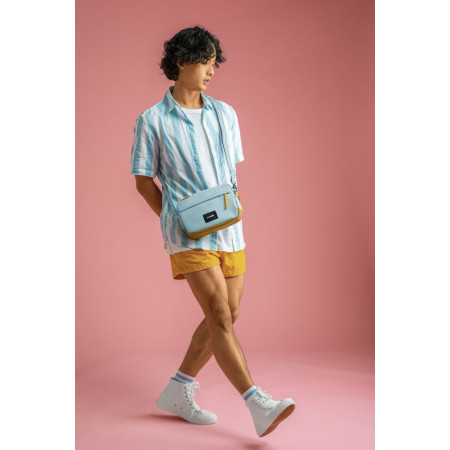 Сумка через плече антизлодій Pacsafe GO Crossbody (свіжий м'ятний/помаранчевий)