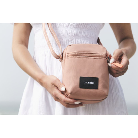 Сумка через плече антизлодій Pacsafe GO Micro Crossbody (рожевий)