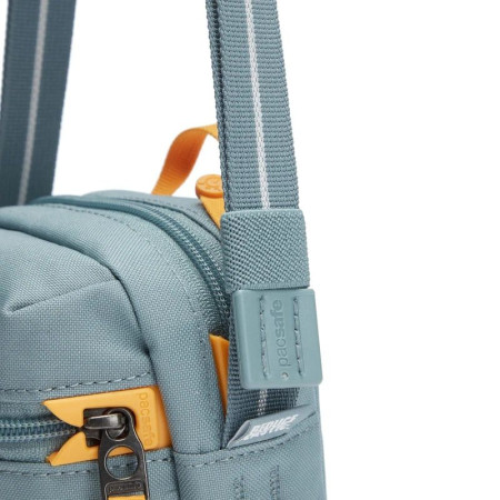 Сумка через плече антизлодій Pacsafe GO Micro Crossbody (свіжий м'ятний/помаранчевий)