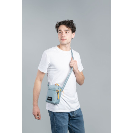 Сумка через плече антизлодій Pacsafe GO Micro Crossbody (свіжий м'ятний/помаранчевий)