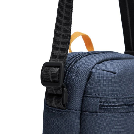 Сумка через плече антизлодій Pacsafe GO Micro Crossbody (темно-синій/жовтий)