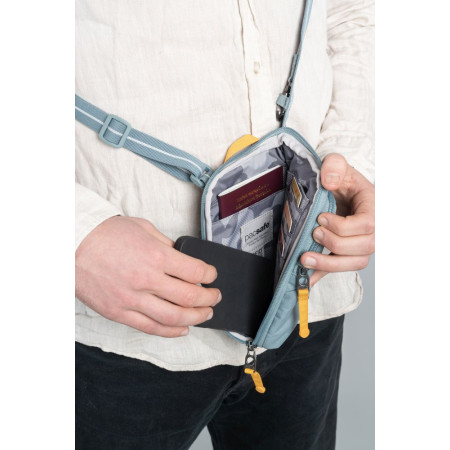 Сумка через плече антизлодій Pacsafe GO Tech Crossbody (свіжий м'ятний/помаранчевий)