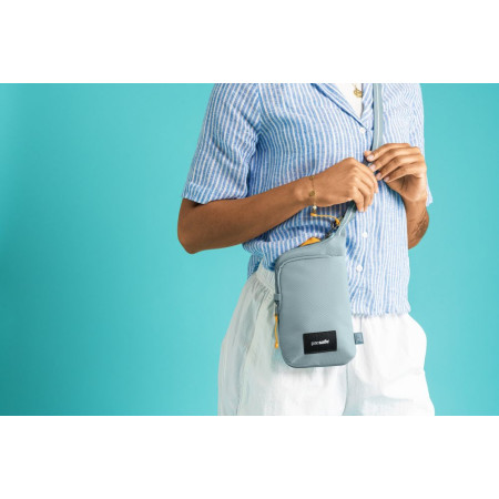 Сумка через плече антизлодій Pacsafe GO Tech Crossbody (свіжий м'ятний/помаранчевий)